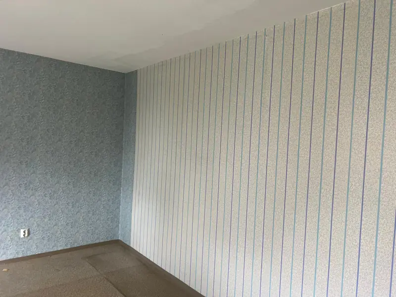 Schlafzimmer mit Schrankwand nach unserem Einsatz – leer und besenrein